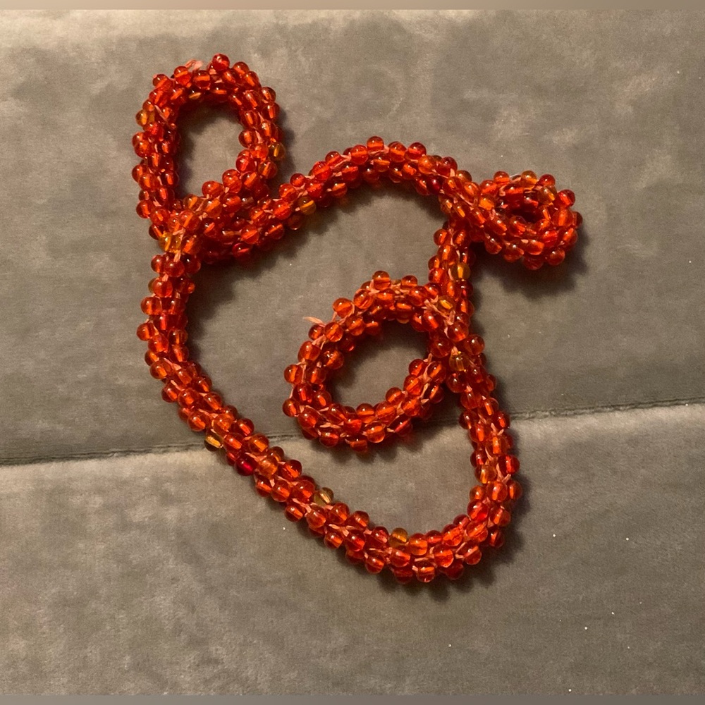 Handcrafted/made  orange glass twisted beads pull over about 11” inch necklace